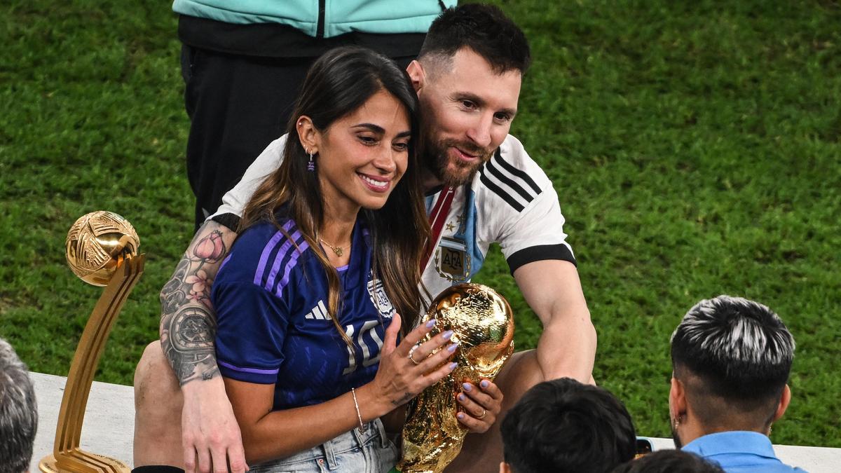 18 December 2022, Qatar, Lusail: Soccer, World Cup, Argentina - France, final round, final, Lusail Stadium, Argentina's Lionel Messi with his wife Antonela Roccuzzo after the match. Photo: Robert Michael/dpa (Photo by Robert Michael/picture alliance via Getty Images)